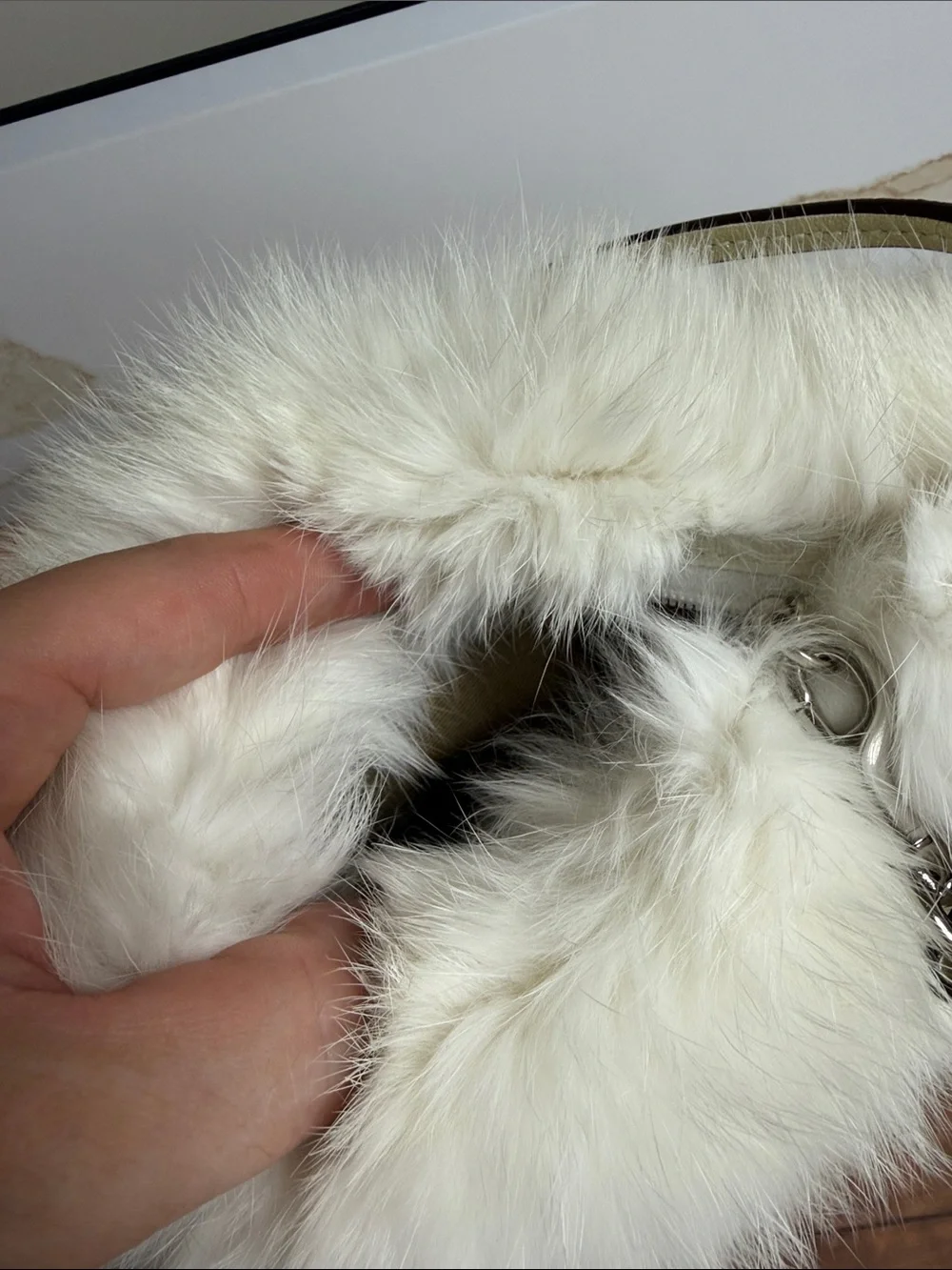 Coach Cream Quilted Wristlet with rabbit hair trim